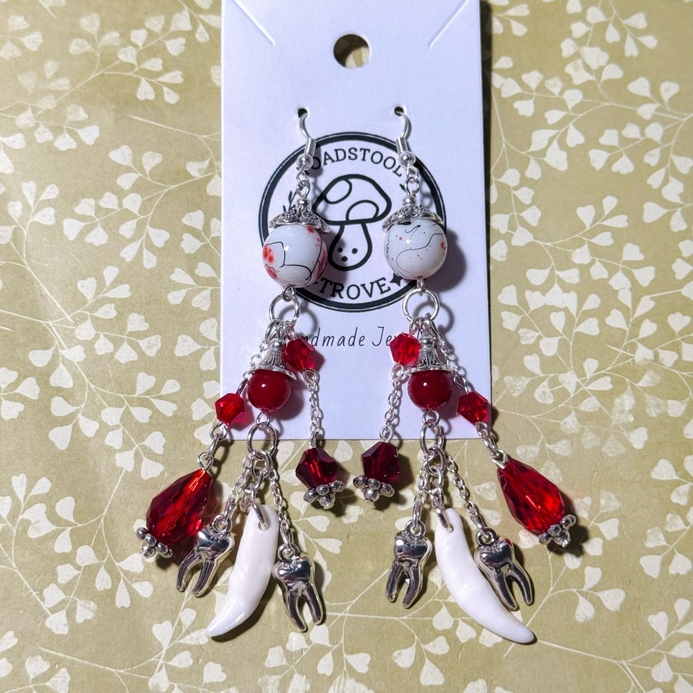 Horror-Inspired Red and Silver Coyote Teeth Dangle Earrings